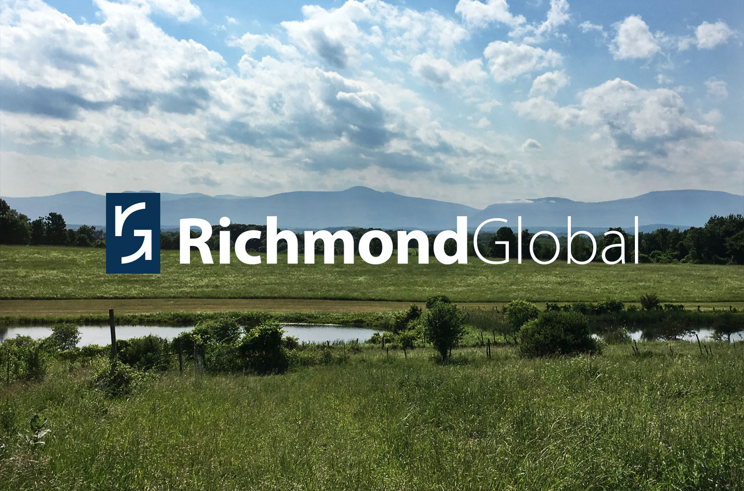 Richmond Global logo with mountain valley background
